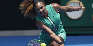 Serena Williams hits a forehand return to Germany's Tatjana Maria during their first round match at the Australian Open tennis championships in Melbourne,Australia,Tuesday,January 15,2019