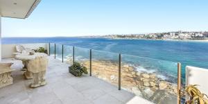 Views for days:Star stock picker buys his neighbour’s $11.3m oceanfront pad