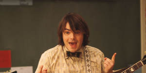 Jack Black in a scene from the movie School of Rock,which the musical is based on.