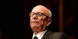 Rupert Murdoch is giving up his bonus after News Corporation reported a quarterly loss.
