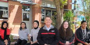 Hampton Park Secondary College students Fadak Jabbar,Vernon Santiago,Zahra Akhlaqee,principal Wayne Haworth,Paige Read,and Skyline Paileguto.