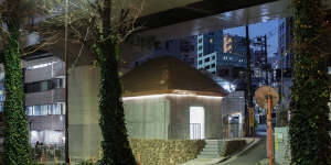 The public toilet that Marc Newson designed is beneath an underpass in Yoyogi Park,Tokyo.