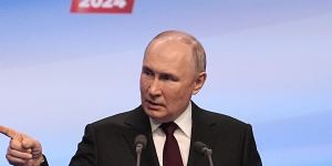 Russian President Vladimir Putin speaking at his campaign headquarters after his election win.