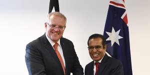 Australian Prime Minister Scott Morrison,left,and East Timorese Prime Minister Taur Matan Ruak shake hands after a bilateral meeting in Dili,East Timor,last year.