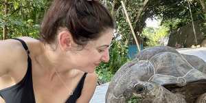 The writer meets Papaya,La Digue’s resident giant tortoise.