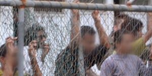 Asylum seekers in a detention centre on Manus Island in 2014.