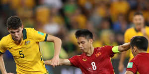 Fran Karacic is challenged by Do Hung Dung of Vietnam.