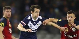 Victory’s Robbie Kruse takes on Louis D’Arrigo.