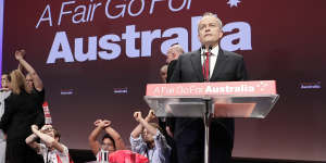 Protesters take to the stage as Bill Shorten delivers his opening address to Labor's triennial national conference.