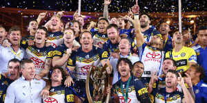 Talks began in 1991,but 14 years later the North Queensland Cowboys celebrate their 2015 golden-point grand final win.