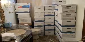 This image,contained in the indictment against Donald Trump,shows boxes of records stored in a bathroom at Mar-a-Lago.