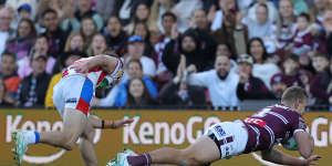 Tom Trbojevic scores on his return to fullback for Manly.