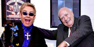 Elton John (left) and Michael Chugg jointly celebrated their 60th birthdays in 2007 at Acer Arena (now Qudos Bank Arena) in Sydney.