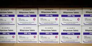 Boxes of the drug mifepristone line a shelf in Alabama. In Australia,the drug along with misprostol,is listed on the Pharmaceutical Benefits Scheme