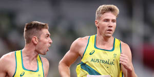 Ash Moloney is encouraged by teammate Cedric Dubler in the last event of the decathlon.