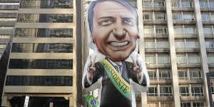 Supporters of Jair Bolsonaro,presidential candidate for the National Social Liberal Party who was stabbed during a campaign event,exhibit a large,inflatable doll in his image to show support for him,in Sao Paulo,Brazil.