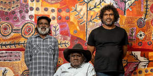Eric Barney and Alec Baker with their work Ngura (Country) and Namatjira.