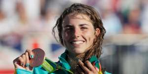 Jessica Fox of Australia holds her bronze medal after the kayak K1 women's final.
