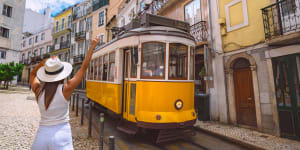 The popular Tram 28 that winds its way along the hilly streets of Alfama and Graça is packed like a Portuguese sardines can,though there's plenty of breeze blowing through the open windows.