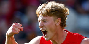 Melbourne’s Jacob van Rooyen celebrates his first AFL goal,in his debut against the Swans