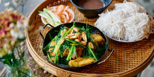 Hanoi speciality cha ca la vong (fish grilled with turmeric and dill) at Co Thu Quan.