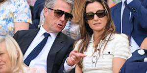 Hugh Grant with wife Anna Elisabet Eberstein. The actor was spotted dozing off at one point during the match.