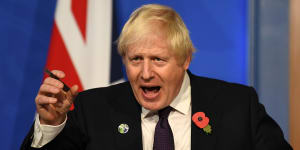 Britain’s Prime Minister Boris Johnson speaks during a press conference inside the Downing Street Briefing Room in London,England. 