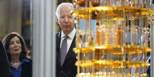US President Joe Biden looks at the IBM System One quantum computer with New York Governor Kathy Hochul during a tour of an IBM facility in Poughkeepsie.