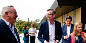 NSW Premier Dominic Perrottet,Minister for Health Brad Hazzard,NSW Health’s Susan Pearce and Parramatta MP Geoff Lee outside the new Granville Centre vaccination clinic on Sunday.