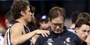 David Teague is consoled by Charlie Curnow during the Blues’ clash with GWS on Saturday night.