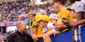 Eddie Jones mingles with fans at the Sydney Sevens.