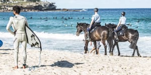 Police patrol at Bondi to enforce COVID-19 restrictions in August 2021.