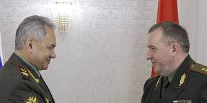 Russian Defence Minister Sergei Shoigu (left) and his Belarusian counterpart,Viktor Khrenin,meet in Minsk on Thursday.