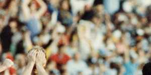 Chris Langford celebrates,while Gary Ablett laments Geelong's defeat.