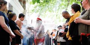 Supporters of the Yes campaign gathered outside the Tandanya Aboriginal Cultural Institute in Adelaide.