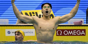 Qin Haiyang celebrates his 2023 world championship win against Australia’s Zac Stubblety-Cook in the men’s 200m breaststroke.