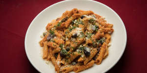 Penne puttanesca pinging with garlic,anchovies and tomatoes.