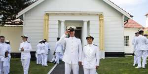 Navy recruits Rahal Dergham and Raine Alexa Dela Cruz in their ceremonial uniform at the HMAS Cresswell.