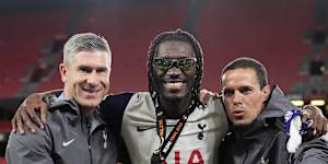 Nick Montgomery (left) and Sergio Raimundo (right) with Yves Bissouma (centre) after Tottenham’s Europa League win.