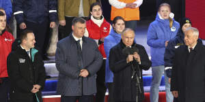 Vladimir Putin speaks next to candidates who ran in the Russian presidential elections against him,Vladislav Davankov,left,Leonid Slutsky,second left and Nikolai Kharitonov,right. 