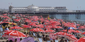 There was little room to move on Brighton Beach as people tried to find some relief from the scorching heat in England.