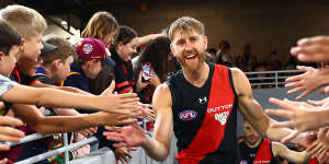 Lions hold off late Bombers charge as Heppell says farewell;Swans seal minor premiership