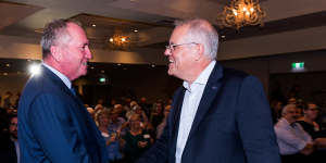 Scott Morrison greets Barnaby Joyce at the event.