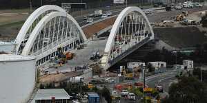 Westbound lanes on one of the twin arch bridges over Alexandra Canal are due to open in the middle of the year.