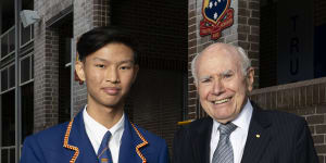 John Howard with fellow chess player,Hugo Tang,15,at his former school,Canterbury Boys.
