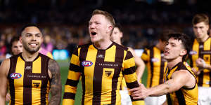 James Sicily of the Hawks reacts to Ken Hinkley,senior coach of the Power,after their semi-final match.