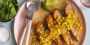 Salmon fillets with buttered garlic corn.