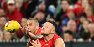 Steven May marks in front of Lance Franklin.