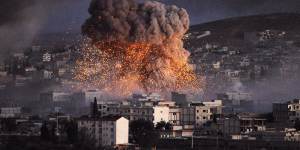 An explosion rocks the Syrian town of Kobane during a battle between Islamic State and the Kurdish forces last year.