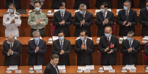 Chinese president Xi Jinping is applauded by delegates at last year’s National People’s Congress. 